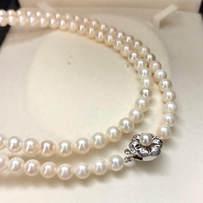 Long Akoya pearl necklace with two strands of round white pearls 7.5mm in size