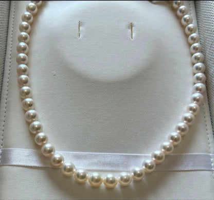 Akoya Flower Pearl Necklace with 7.5-8.0mm pink pearls, 43cm length, silver clasp, displayed on white background