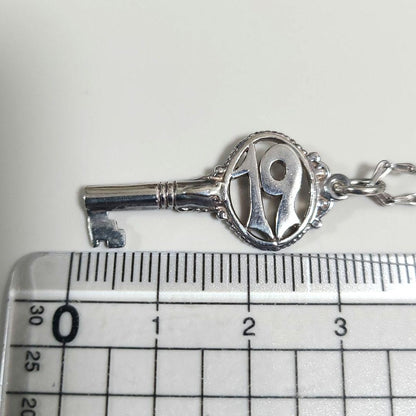 Agate Silver 925 key-shaped pendant necklace with a 40cm silver chain on white background