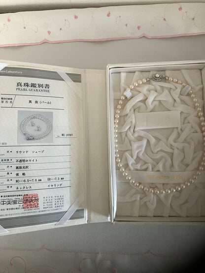 Akoya pearl necklace with 6.5-7mm white pearls, 45cm length, displayed on a white background