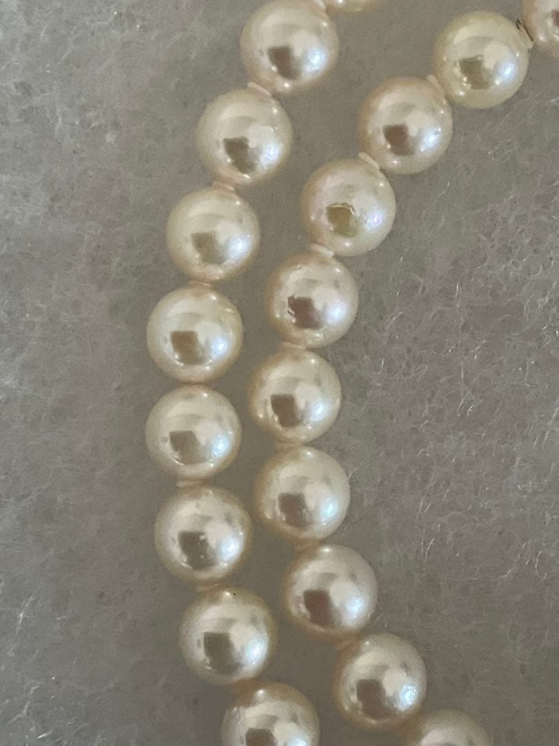 Akoya pearl necklace with 6.5-7mm white pearls, 45cm length, displayed on a white background