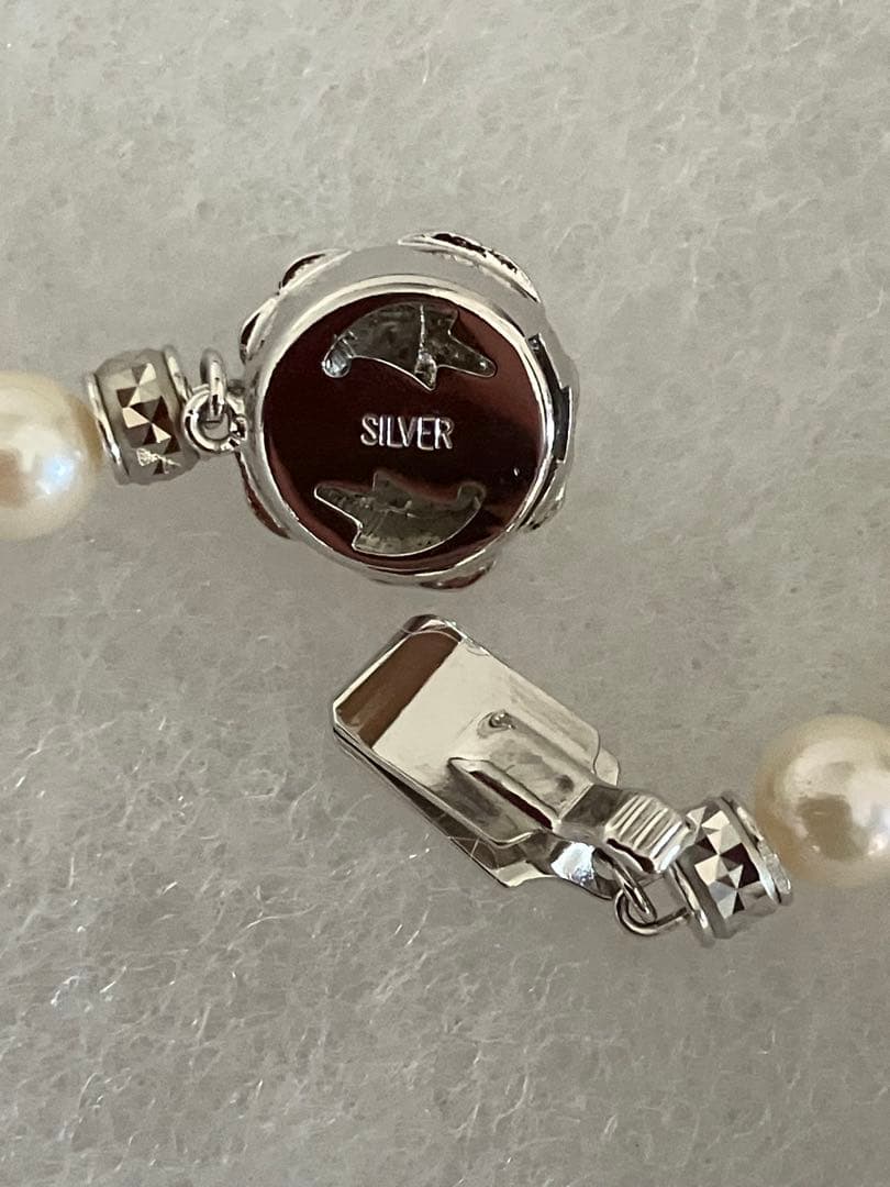 Akoya pearl necklace with 6.5-7mm white pearls, 45cm length, displayed on a white background