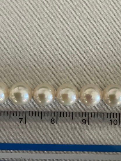 Akoya pearl necklace with 6.5-7mm white pearls, 45cm length, displayed on a white background