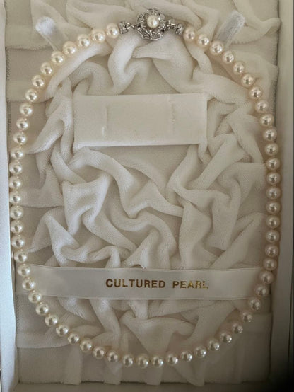 Akoya pearl necklace with 6.5-7mm white pearls, 45cm length, displayed on a white background