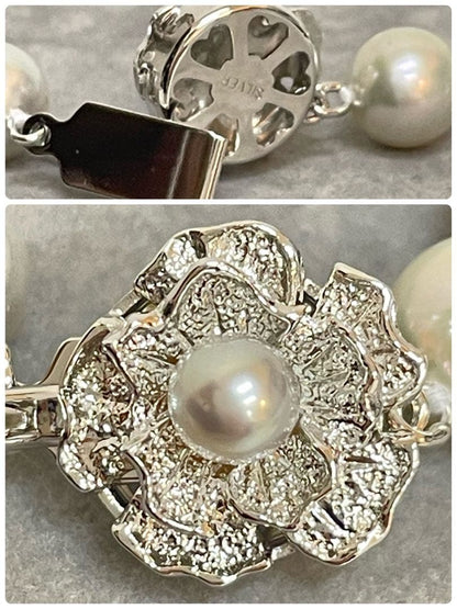 Akoya pearl necklace with natural blue gray pearls sized 8.1 to 8.7mm and silver clasp on 47cm chain