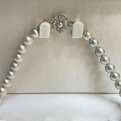 Akoya pearl necklace with natural blue gray pearls sized 8.1 to 8.7mm and silver clasp on 47cm chain