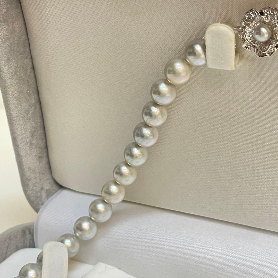 Akoya pearl necklace with natural blue gray pearls sized 8.1 to 8.7mm and silver clasp on 47cm chain