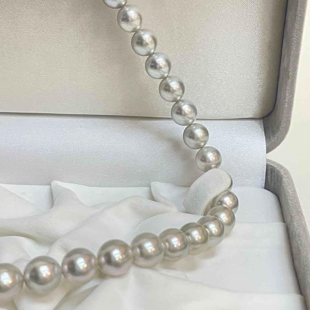 Akoya pearl necklace with natural blue gray pearls sized 8.1 to 8.7mm and silver clasp on 47cm chain