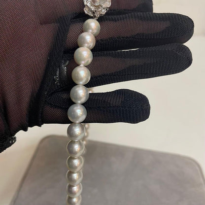Akoya pearl necklace with natural blue gray pearls sized 8.1 to 8.7mm and silver clasp on 47cm chain