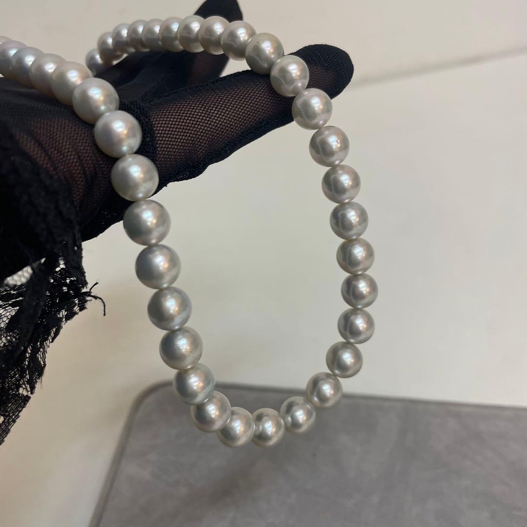 Akoya pearl necklace with natural blue gray pearls sized 8.1 to 8.7mm and silver clasp on 47cm chain