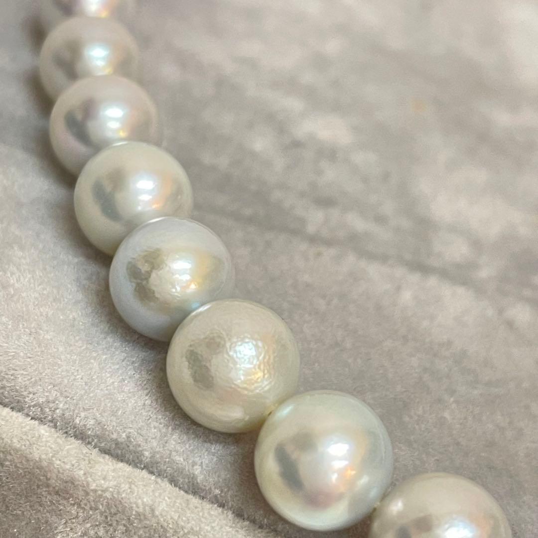 Akoya pearl necklace with natural blue gray pearls sized 8.1 to 8.7mm and silver clasp on 47cm chain
