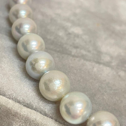 Akoya pearl necklace with natural blue gray pearls sized 8.1 to 8.7mm and silver clasp on 47cm chain