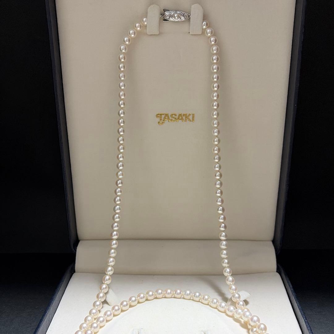 TASAKI Akoya pearl long necklace featuring 6.0mm pearls with strong luster on a 96cm strand