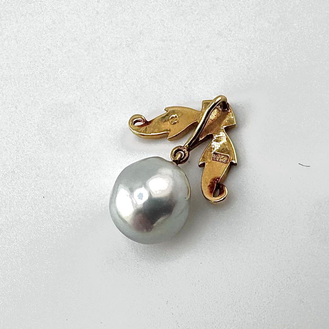 Mikimoto K14 pearl pendant featuring a blue-tinged 8-9mm pearl with a leaf motif in a vintage design
