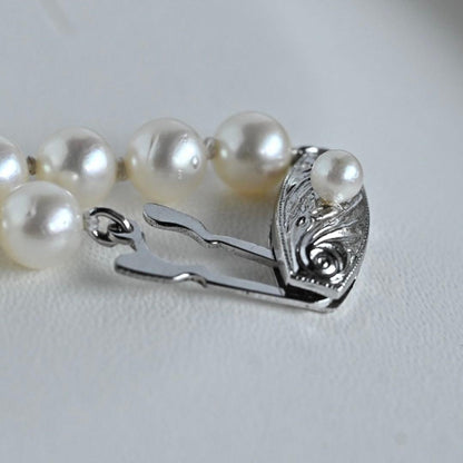 Tasaki Akoya pearl necklace with 6.5mm round pearls and silver clasp, 40cm length