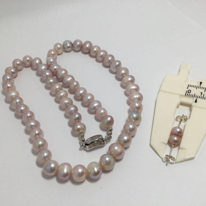 Purple freshwater pearl necklace and matching earrings with silver clasp, 45-46 cm length, round to oval pearls