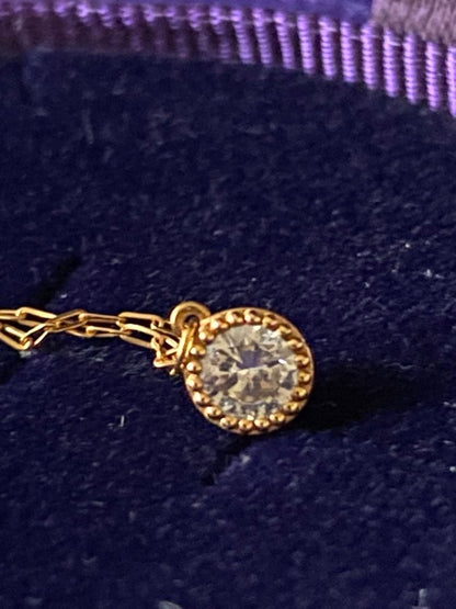 Agete K18 gold necklace featuring a 0.15-carat single diamond with milgrain detail on a 45cm slide chain
