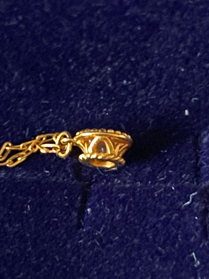 Agete K18 gold necklace featuring a 0.15-carat single diamond with milgrain detail on a 45cm slide chain
