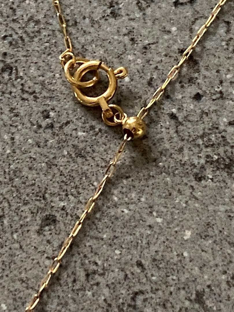 Agete K18 gold necklace featuring a 0.15-carat single diamond with milgrain detail on a 45cm slide chain