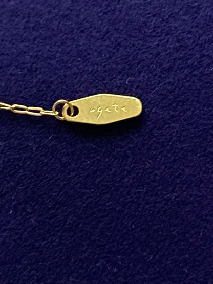 Agete K18 gold necklace featuring a 0.15-carat single diamond with milgrain detail on a 45cm slide chain