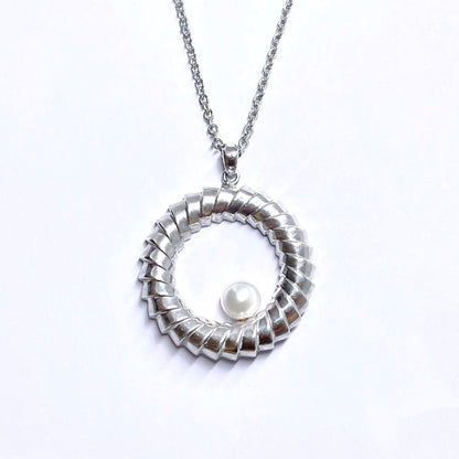 Mikimoto silver necklace pendant top featuring a 5.5mm white pearl with silver chain