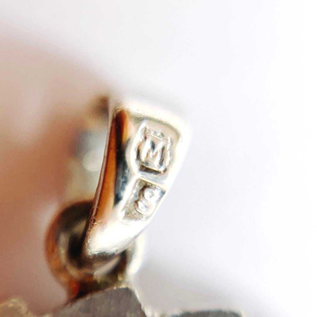 Mikimoto silver necklace pendant top featuring a 5.5mm white pearl with silver chain