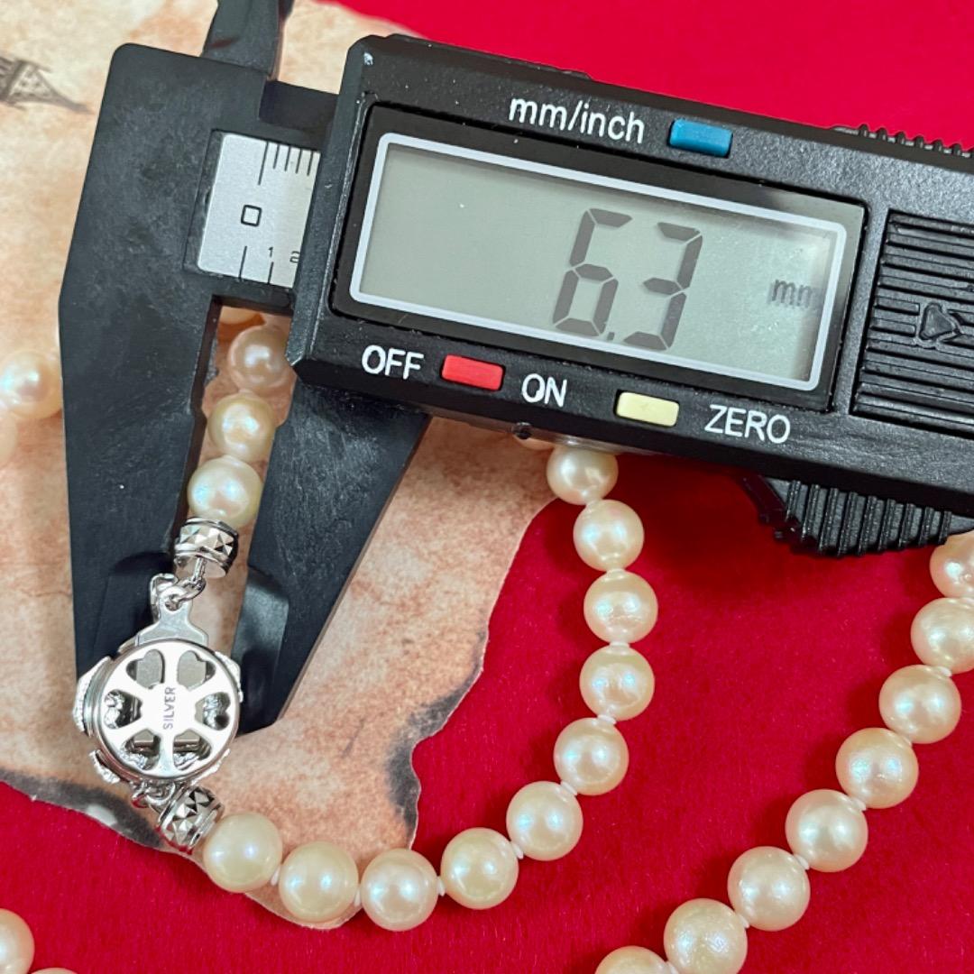 A33 Akoya pearl necklace with approximately 6mm genuine pearls on a 44cm cord