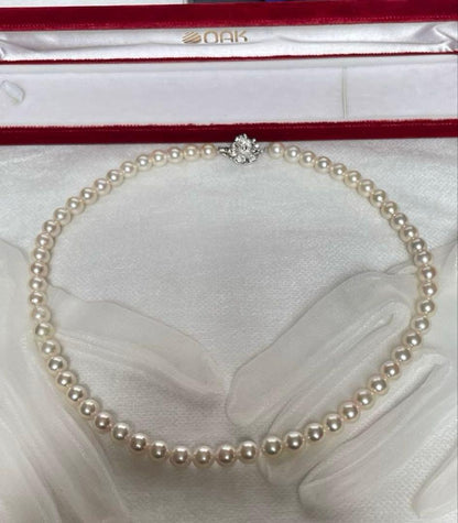 Vintage Akoya pearl necklace with 59 white semi-round pearls, 8mm size, 46cm length