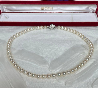 Vintage Akoya pearl necklace with 59 white semi-round pearls, 8mm size, 46cm length