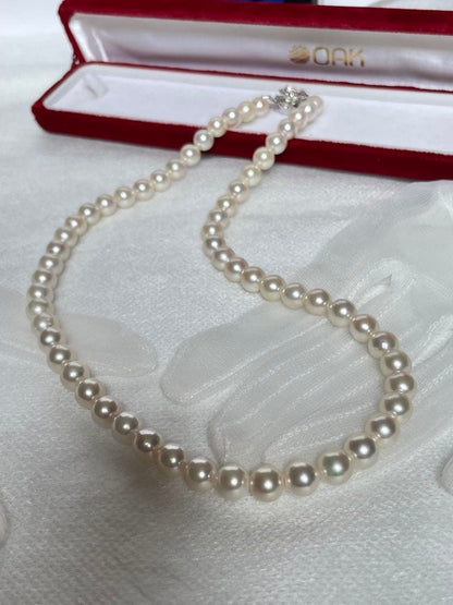 Vintage Akoya pearl necklace with 59 white semi-round pearls, 8mm size, 46cm length