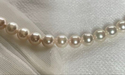 Vintage Akoya pearl necklace with 59 white semi-round pearls, 8mm size, 46cm length
