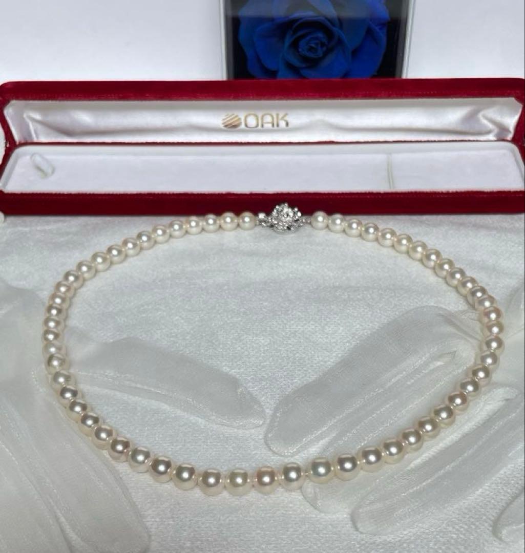 Vintage Akoya pearl necklace with 59 white semi-round pearls, 8mm size, 46cm length