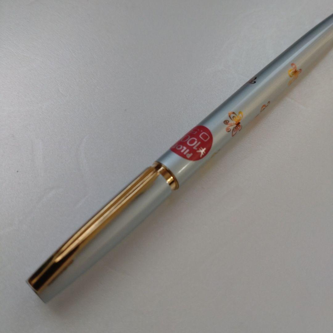 Discontinued Showa retro mechanical pencil in sky blue metallic with gradient butterfly print and push-cap style