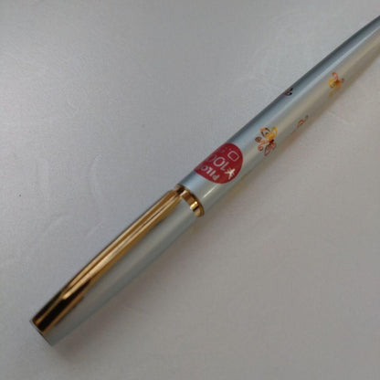 Discontinued Showa retro mechanical pencil in sky blue metallic with gradient butterfly print and push-cap style