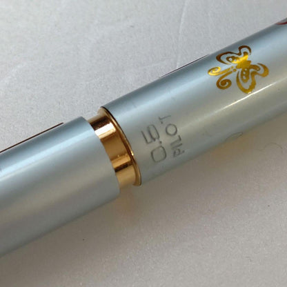 Discontinued Showa retro mechanical pencil in sky blue metallic with gradient butterfly print and push-cap style
