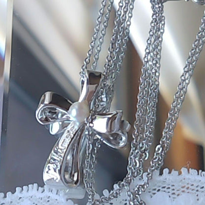 MIKIMOTO Silver Pearl Cross Necklace with 40 cm chain displayed on white background