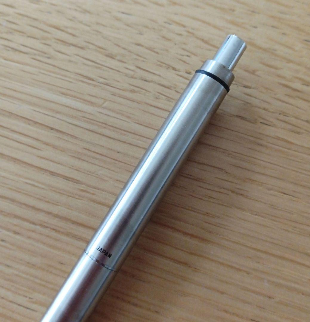 Pilot knock type ballpoint pen with silver metal shaft and black fine point ink