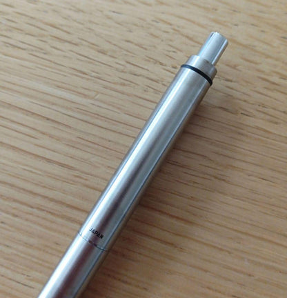 Pilot knock type ballpoint pen with silver metal shaft and black fine point ink