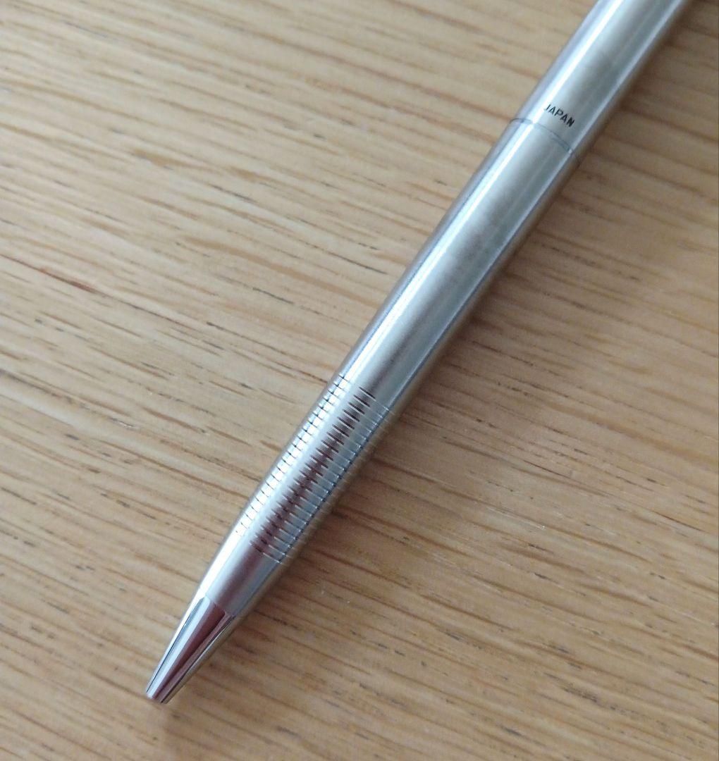 Pilot knock type ballpoint pen with silver metal shaft and black fine point ink