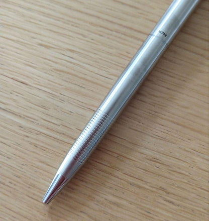 Pilot knock type ballpoint pen with silver metal shaft and black fine point ink