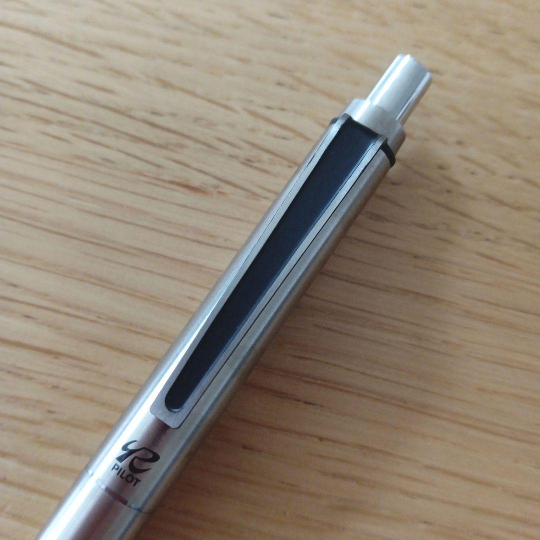 Pilot knock type ballpoint pen with silver metal shaft and black fine point ink