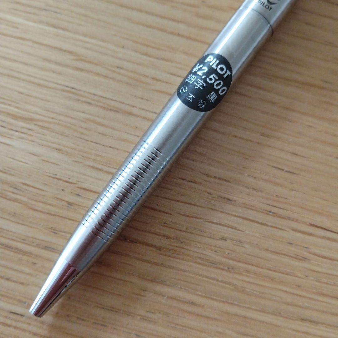 Pilot knock type ballpoint pen with silver metal shaft and black fine point ink