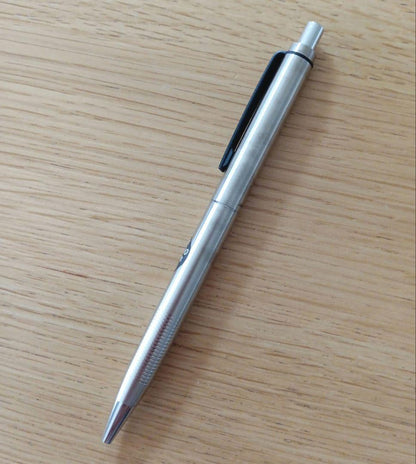 Pilot knock type ballpoint pen with silver metal shaft and black fine point ink