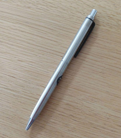 Pilot knock type ballpoint pen with silver metal shaft and black fine point ink