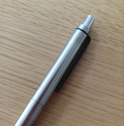 Pilot knock type ballpoint pen with silver metal shaft and black fine point ink