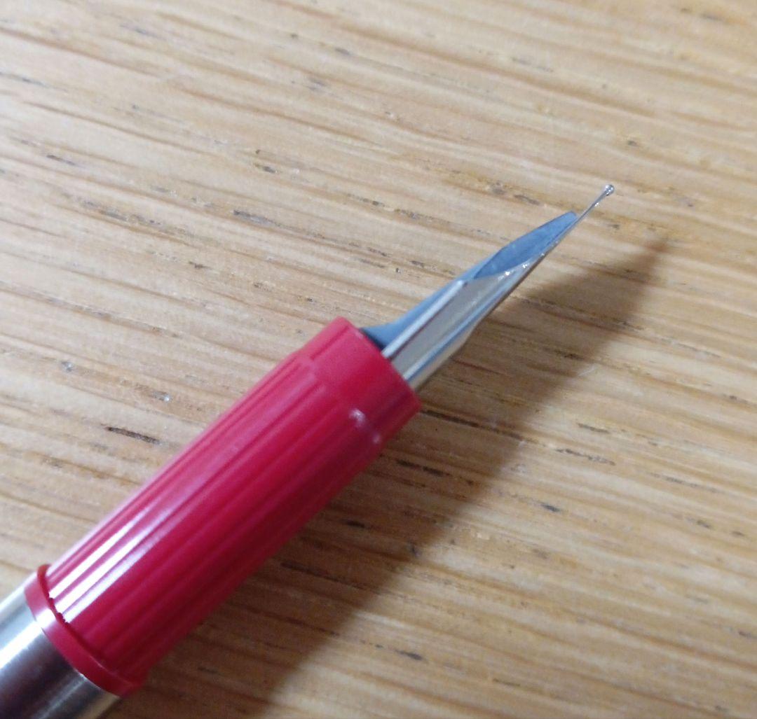Pilot Birdie Mini Fountain Pen with silver and red body and fine nib displayed on white background