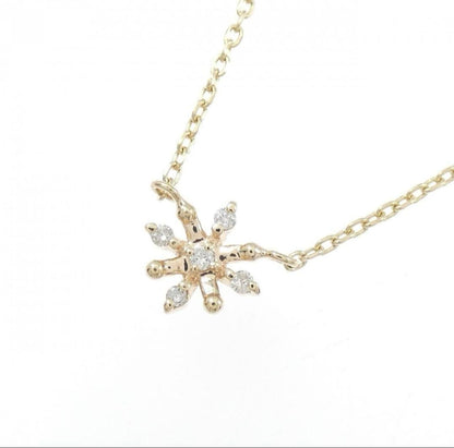 Agat diamond necklace featuring a 0.03CT snowflake pendant with a 6.5x6.7 mm size on a slim chain