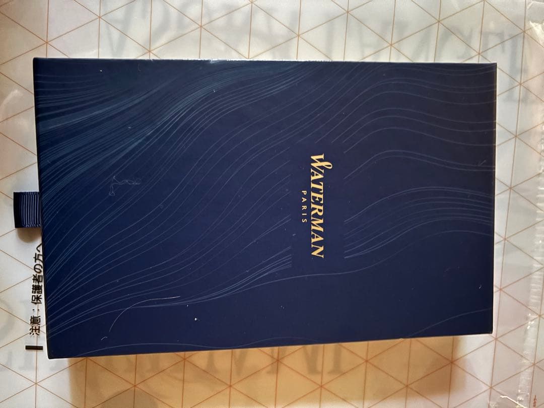 Waterman Metropolitan Essential Orange ballpoint pen in red-orange color with special and leather pen cases