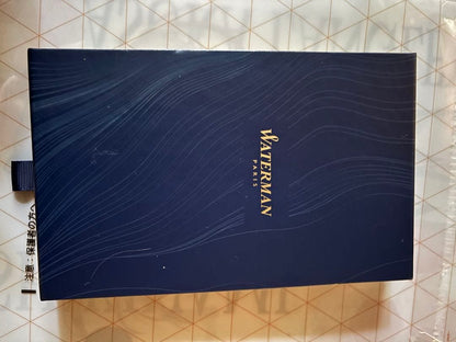 Waterman Metropolitan Essential Orange ballpoint pen in red-orange color with special and leather pen cases
