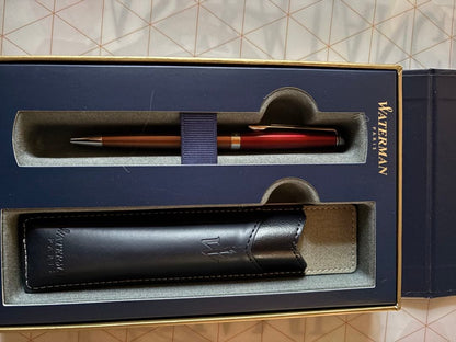 Waterman Metropolitan Essential Orange ballpoint pen in red-orange color with special and leather pen cases